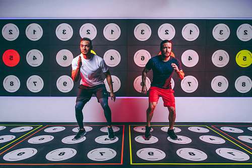 person two men doing pavigym apparel