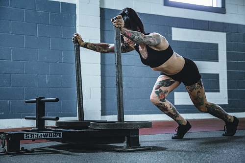 person woman doing workout in room people