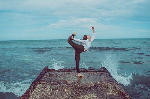 person woman in black pants outdoors