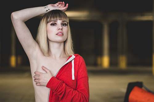 person woman in red jacket clothing