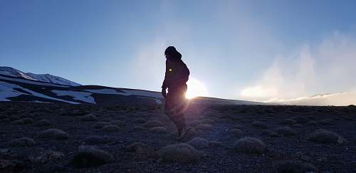 flare woman on field light