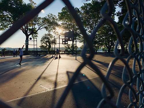 flare woman playing ball light