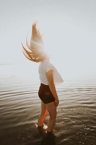 person woman standing in body of water people