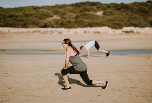 people woman wearing grey tank top doing exercise person