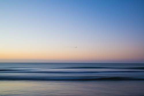 outdoors body of water under blue sky at golden hour water