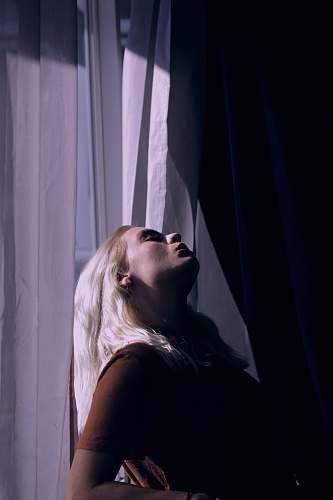 ogden woman leaning on window united states