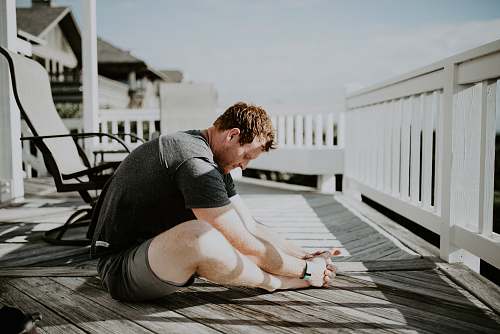 human man doing yoga in porch people