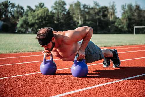 sport man exercising on field during daytime sports