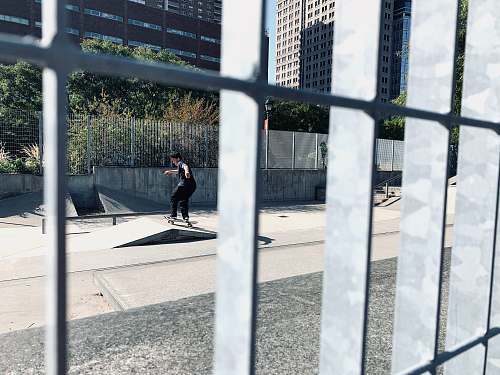 human man skateboarding asphalt