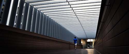 architecture man walking inside building dubai