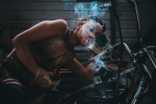 human person blowing smoke people