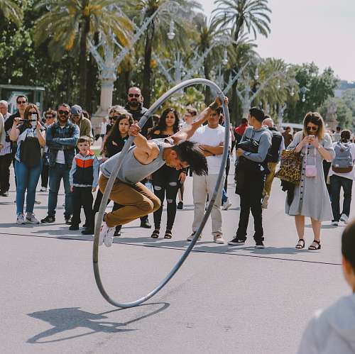human person performing acrobats crowd