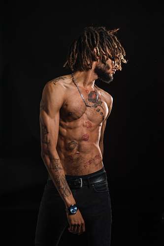 people topless man with tattoos human