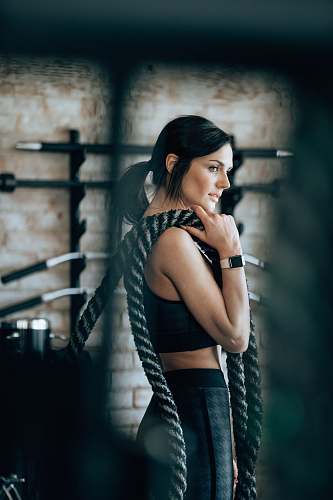 apparel woman holding black rope clothing