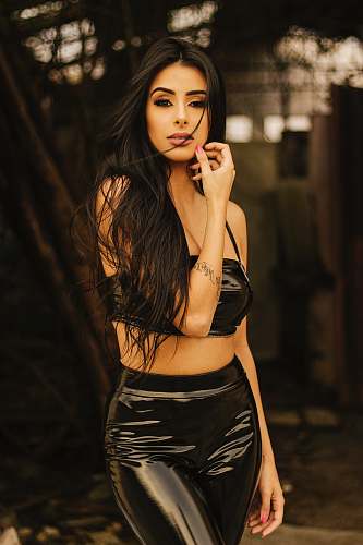 human woman in black silk top and pants people