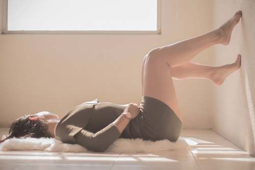 human woman lying on floor exercise