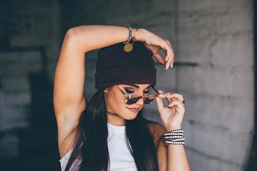 people woman put left hand on head fashion