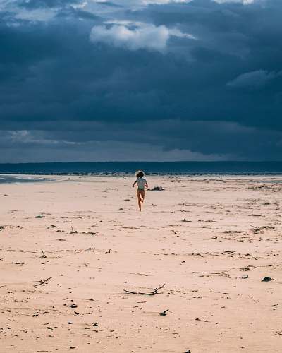 human woman running in sand nature