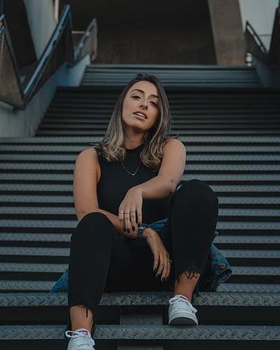 people woman sitting on stairs human