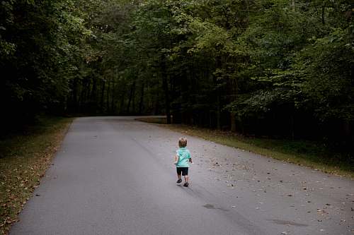 path children sitting on road kid
