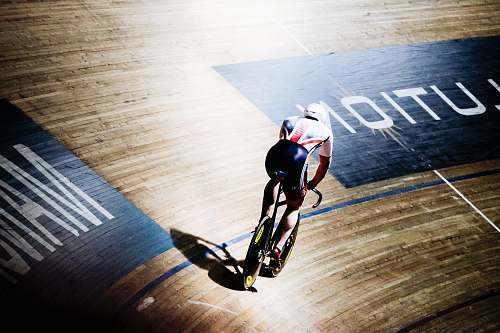 bike man riding bike on indoor cycling field bicycle