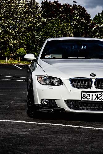 car white BMW car automobile