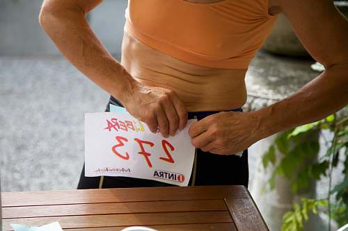 italy woman holding white paper 273