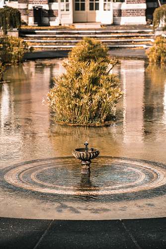 outdoors black and grey fountain nature