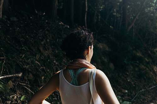 japan woman in white tank top working out