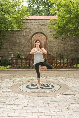 human woman standing using one foot person